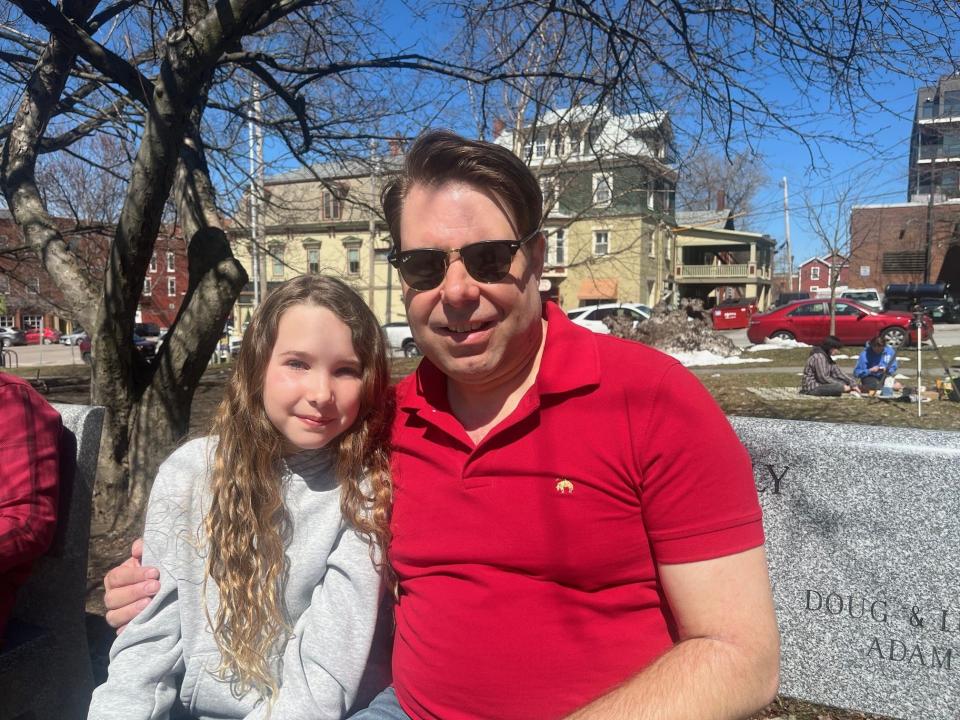 Jean Sebastian Leburn and his daughter, Juliette, only had to drive about an hour from the Montreal suburbs to witness the eclipse from Taylor Park in St. Albans, Vermont, as seen on April 8, 2024.