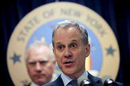 FILE PHOTO: New York Attorney General Eric Schneiderman speaks at a news conference to announce a state-based effort to combat climate change in New York, New York, U.S. March 29, 2016. REUTERS/Mike Segar/File Photo