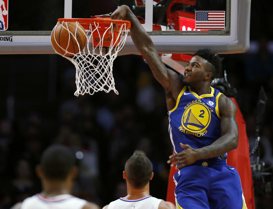 Golden State Warriors forward Jordan Bell dunks against the Los Angeles Clippers. (AP Photo/Ryan Kang)