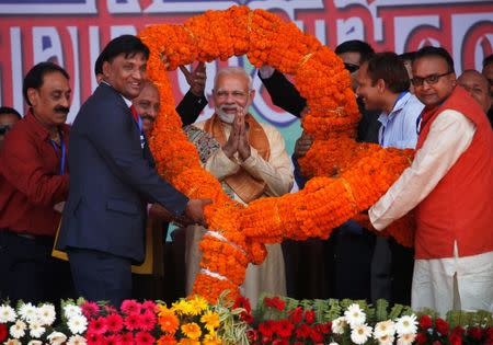 India's Prime Minister Narendra Modi is offered a 121 Kg garland during the civic felicitation in Janakpur, Nepal May 11, 2018. REUTERS/Navesh Chitrakar