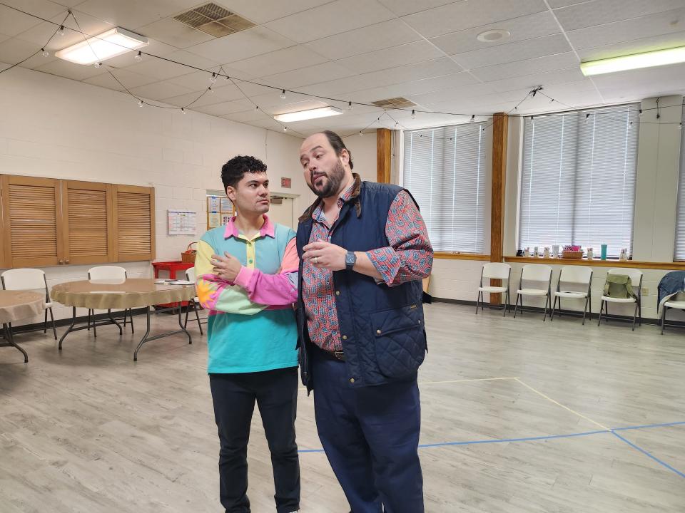 Amarillo Opera cast members Nicholas Flott as Borsa, left, and Eric Barry as the Duke of Montua rehearse for the upcoming production of Verdi's "Rigoletto." The production will be held April 1 in the Globe-News Center for the Performing Arts.