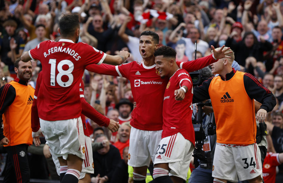 Manchester United&#39;s Cristiano Ronaldo celebrates scoring their second goal with his new teammates. 