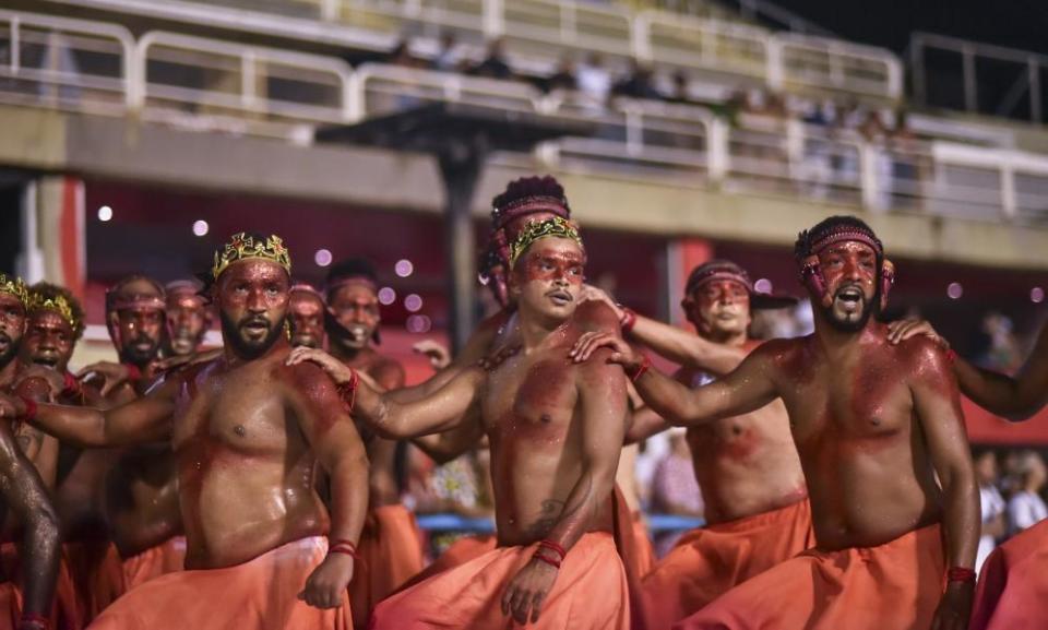 Samba school attendants practise dancing on the third day of rehearsals before the Rio carnival