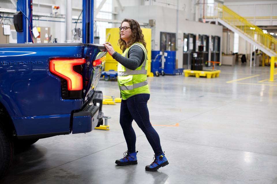 Megan Gegesky, an engineer at Ford Motor Co., works on the F-150 Lightning on April 6 at the factory in Dearborn prior to the Tuesday launch celebration.