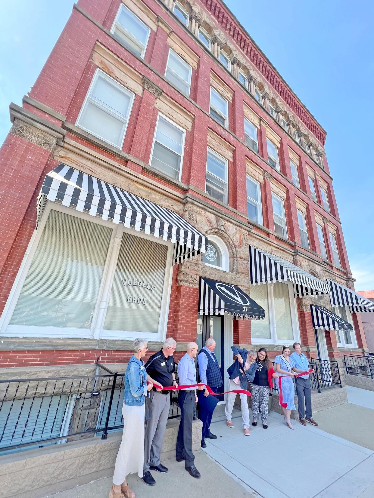 The Voegele Historic Lofts at 211 N. Main St. in Mansfield officially opened with a ribbon cutting ceremony Thursday afternoon.