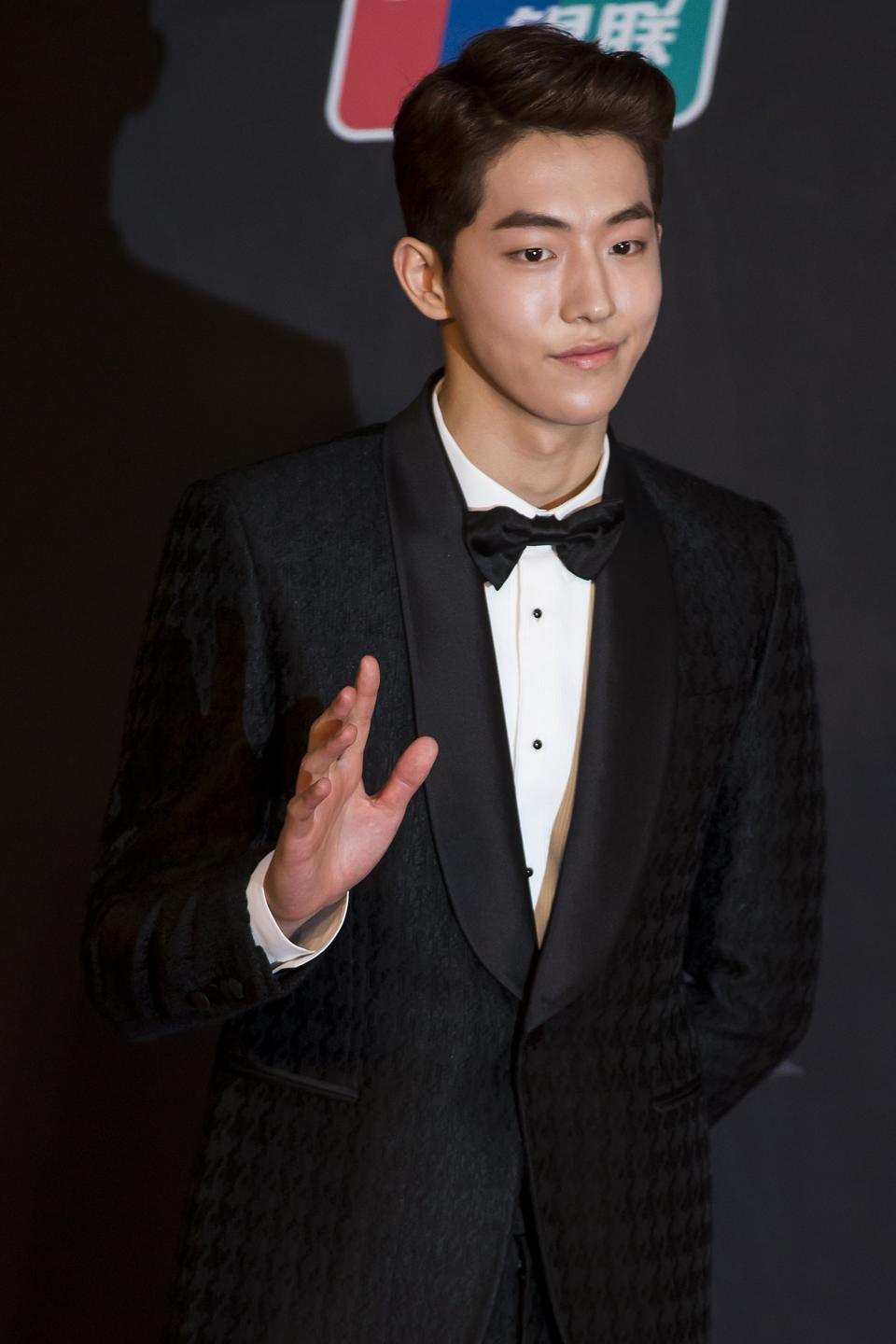 South Korean model Nam Joo Hyuk poses on the red carpet as he attends the 2014 Mnet Asian Music Awards (MAMA) in Hong Kong