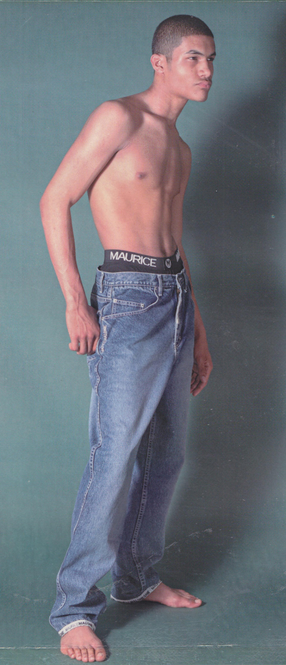 Maurice Malone’s iconic logo cuff jeans in an advertisement from the 1990s, photographed by Malone at his Williamsburg Brooklyn studio.