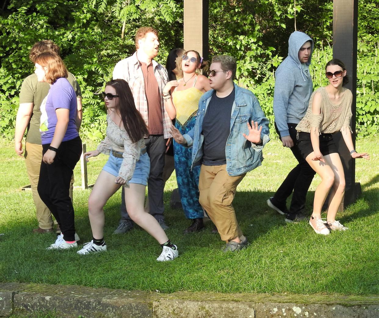 The cast of "Godspell" by Rogue Elephant Productions rehearse a musical number. The play is the first two weekends in July at Clary Gardens.