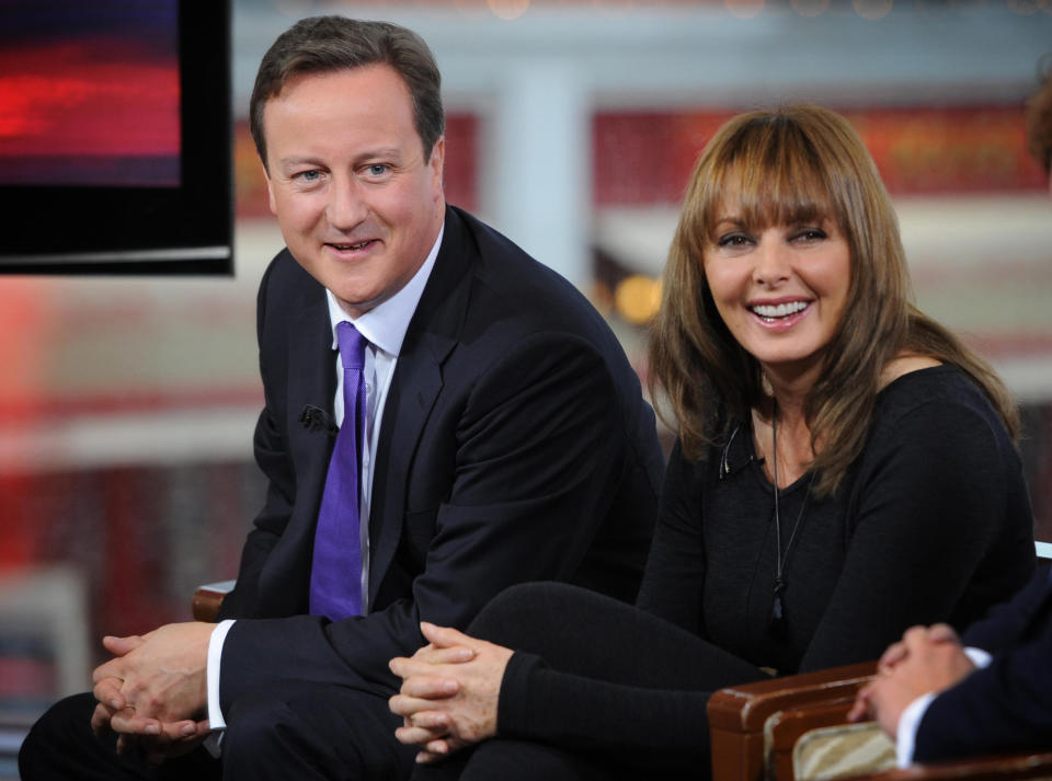 Prime Minister David Cameron appears on the BBC1's The Andrew Marr show in Birmingham with newspaper reviewer Carol Vorderman, ahead of the start of this year's Annual Conservative Party Conference.   (Photo by Stefan Rousseau/PA Images via Getty Images)
