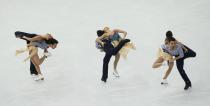 Spain's Sara Hurtado and Adria Diaz compete during the Figure Skating Ice Dance Free Dance Program at the Sochi 2014 Winter Olympics, February 17, 2014. Picture is taken with multiple exposure. REUTERS/Marko Djurica (RUSSIA - Tags: SPORT FIGURE SKATING SPORT OLYMPICS)