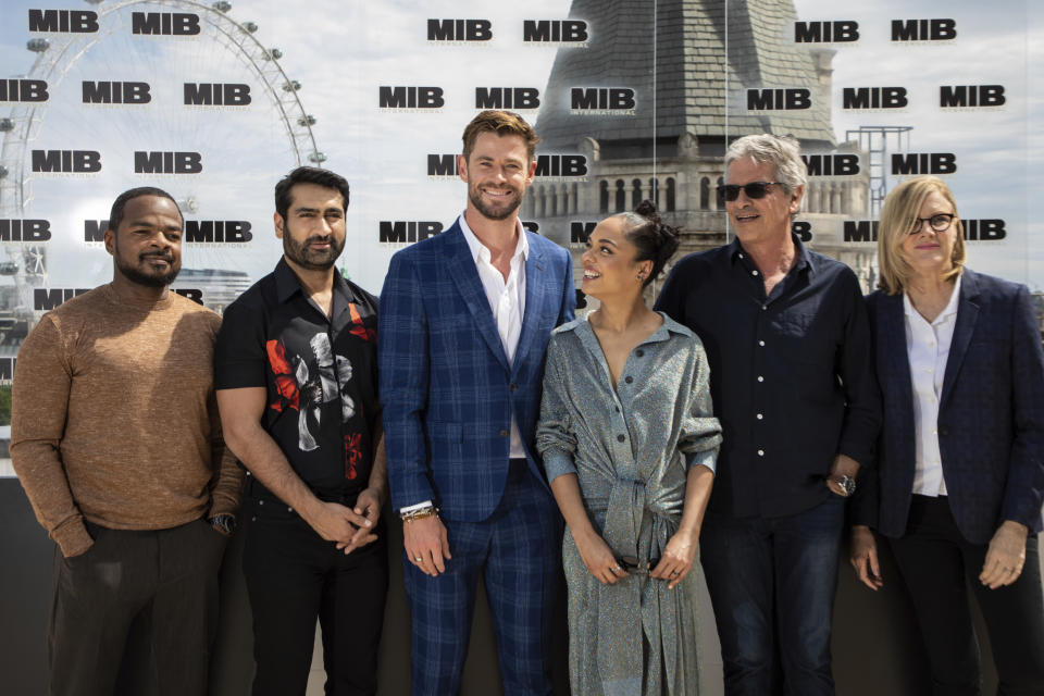 F. Gary Gray, Kumail Nanjiani, Chris Hemsworth, Tessa Thompson, Walter F.Parkes and Laurie MacDonald pose for photographers during a photo call for the film 'Men in Black: International' in London, Sunday, June 2, 2019. (Photo by Vianney Le Caer/Invision/AP)