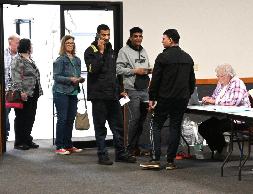 Voters checking into the Coldwater election precinct at the Dearth Center Tuesday.