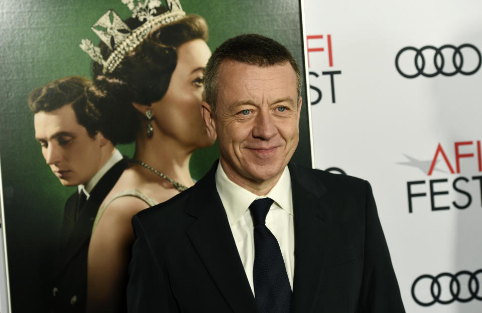 Peter Morgan, the creator/writer/executive producer of the Netflix series "The Crown," poses at a gala screening of the show at the 2019 AFI Fest at the TCL Chinese Theatre, Saturday, Nov. 16, 2019, in Los Angeles. (Photo by Chris Pizzello/Invision/AP)