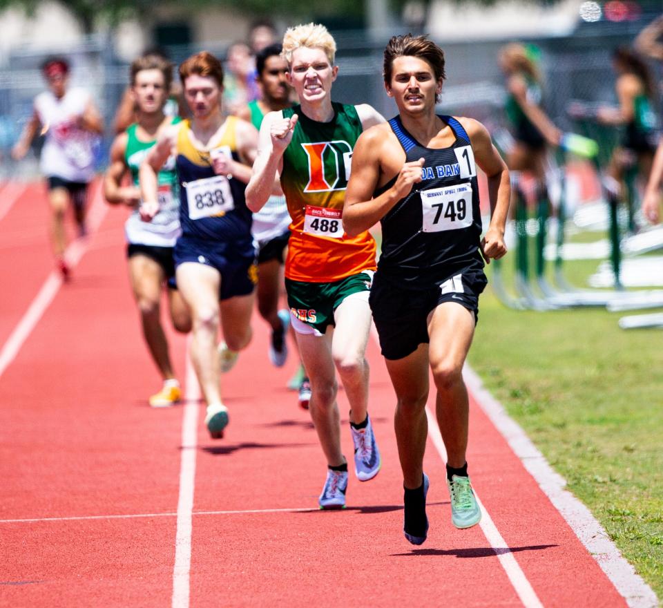 Jacob Fritz of Ida Baker wins the 800 meters with one shoe at the Lee County Athletic Conference Championships at Dunbar High School on Saturday, April 9, 2022. 