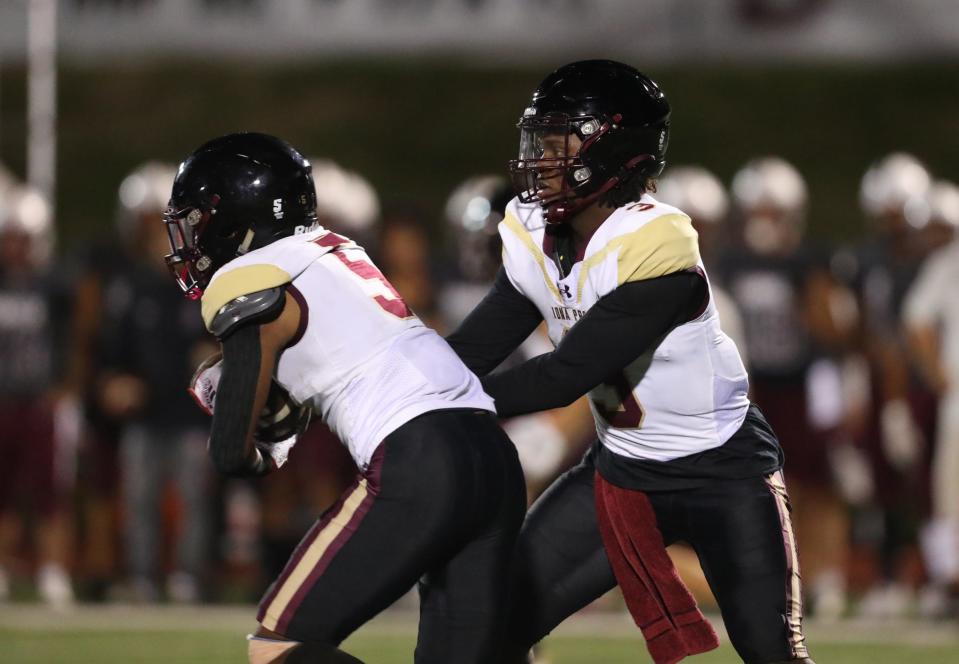 Iona Prep quarterback Ajani Sheppard (3) hands off to Colin O'garro (5) during their 42-35 win over Don Bosco at Don Bosco Preparatory High School in Ramsey, N.J. on Friday, September 16, 2022.  