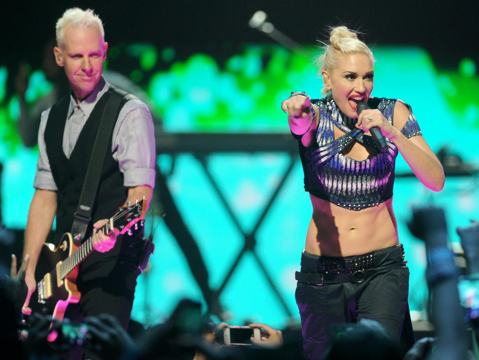 Gwen Stefani and Tom Dumont of No Doubt perform at the iHeart Radio Music Festival on Friday, Sept., 21, 2012 at the MGM Grand Arena in Las Vegas. (Photo by Eric Reed/Invision/AP)