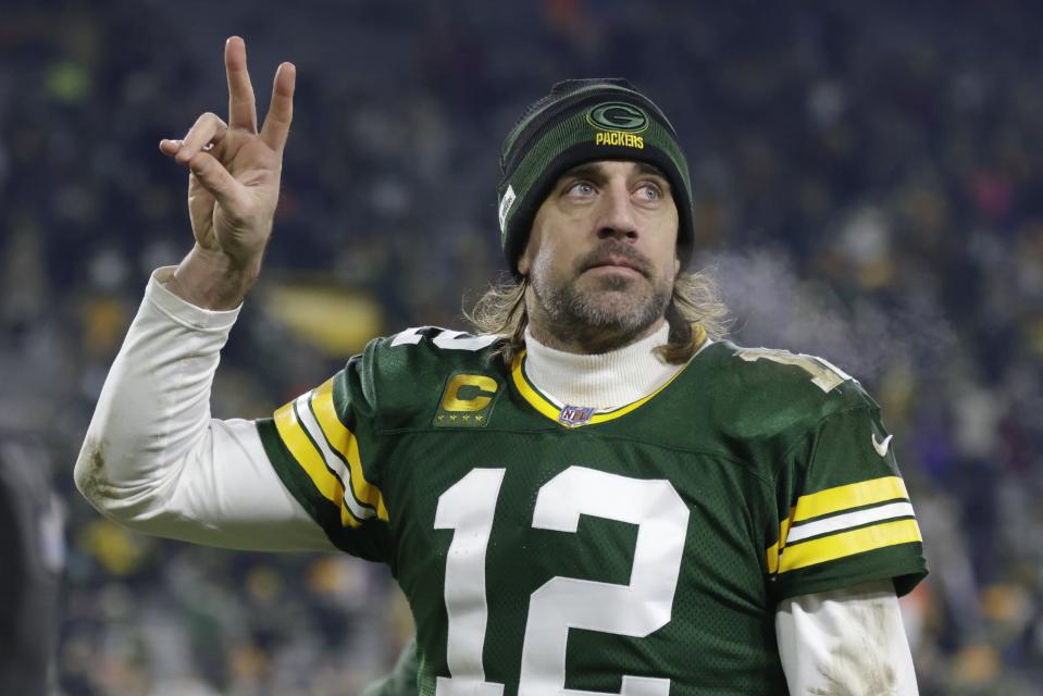 Green Bay Packers' Aaron Rodgers acknowledges the crowd after an NFL football game against the Minnesota Vikings Sunday, Jan. 2, 2022, in Green Bay, Wis. The Packers won 37-10.