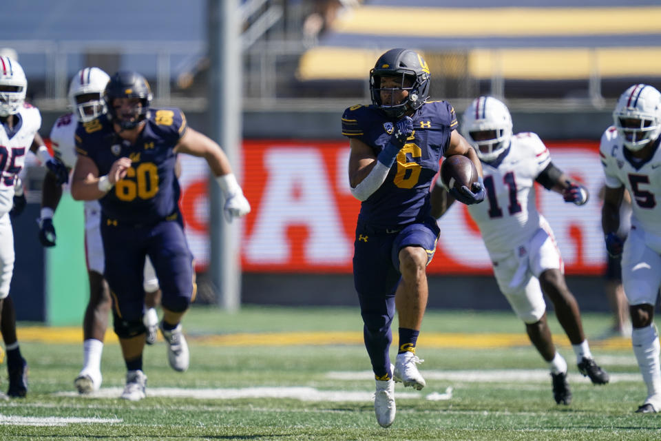 California running back Jaydn Ott (6) runs the ball for a 73-yard touchdown against Arizona during the first half of an NCAA college football game in Berkeley, Calif., Saturday, Sept. 24, 2022. (AP Photo/Godofredo A. Vásquez)