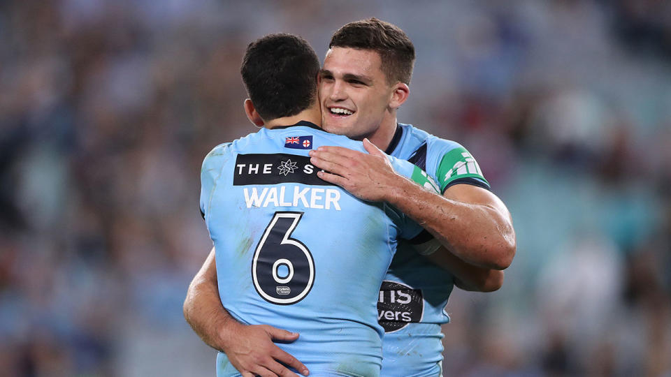 Seen here, NSW halves pair Nathan Cleary and Cody Walker celebrate a win in Game II.