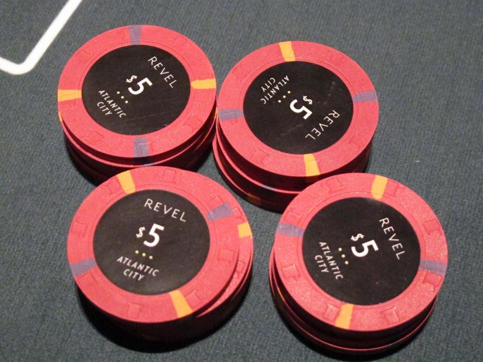 This March 28, 2012, photo, shows gambling chips at the new Revel casino in Atlantic City, N.J., on a table during a "test night." The $2.4 billion casino-resort opens its doors to the public Monday, April 2. (AP Photo/Wayne Parry)