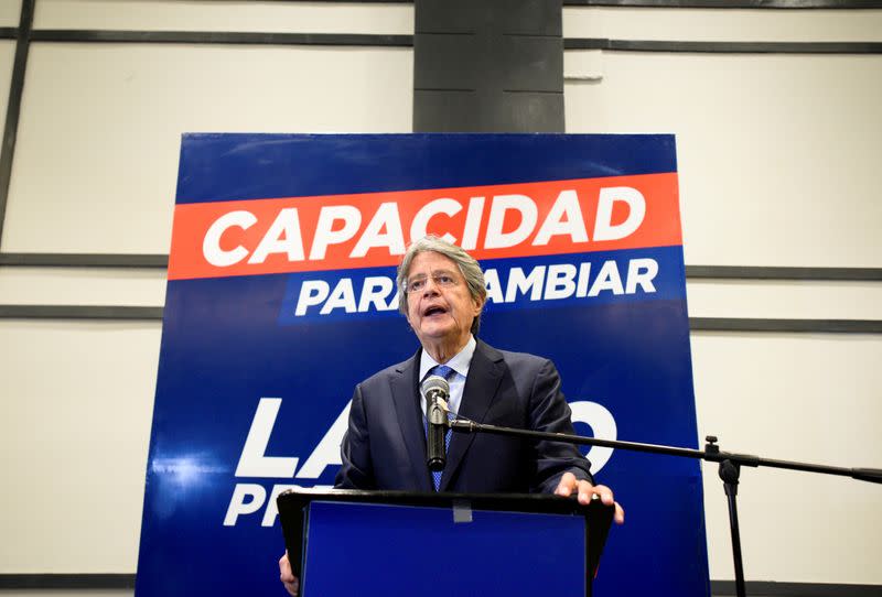 FILE PHOTO: FILE PHOTO: FILE PHOTO: Conservative Ecuadorean presidential candidate Guillermo Lasso addresses the media ahead of the February 7 presidential vote, in Guayaquil