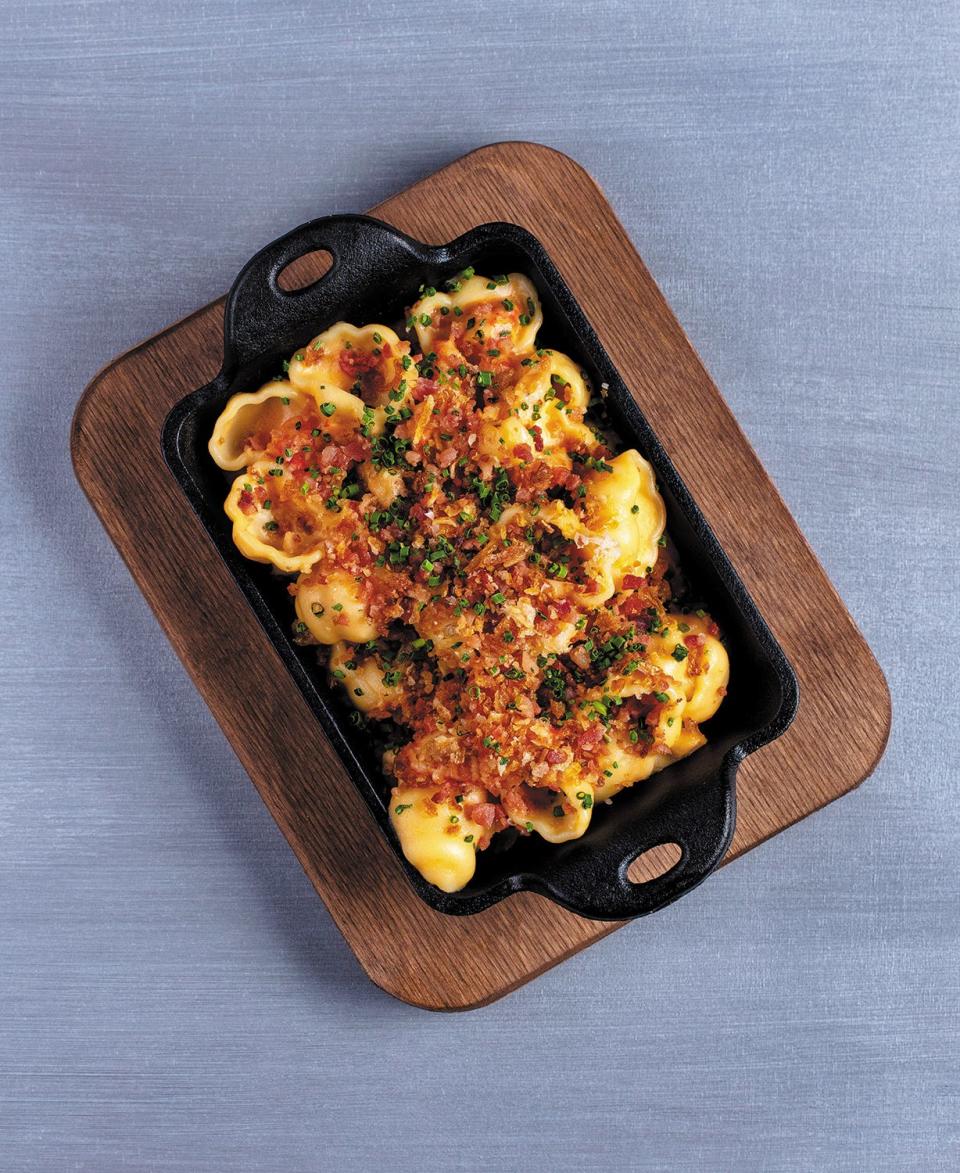 Lucky Shuck in Jupiter honors the dish year-round with its Crawfish Mac and Cheese topped with a bacon-shallot crumble.