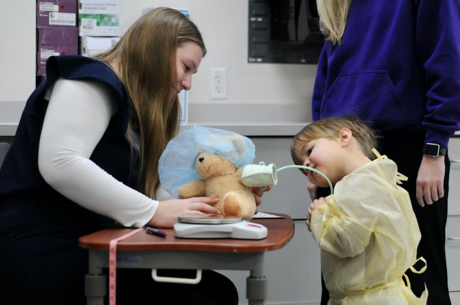 Francis Tuttle Pre-Nursing students treat stuffed animals.