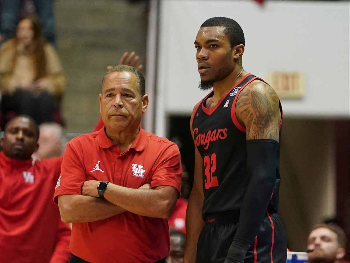 Reggie Chaney playing for the University of Houston Cougars in 2021. He is pictured here with head coach Kelvin Sampson (USA TODAY Sports)