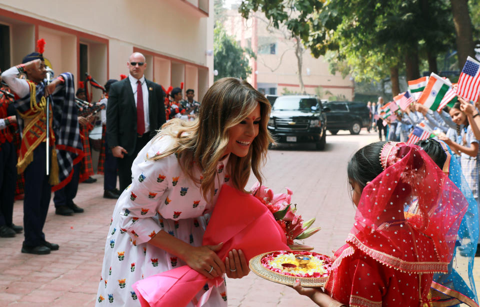 U.S. first lady Melania Trump is welcomed by children at a school in New Delhi, during a visit of U.S. President Donald Trump in India, February 25, 2020. REUTERS/Anushree Fadnavis