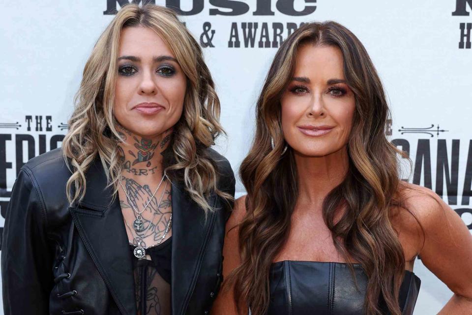 <p>Leah Puttkammer/Getty</p> Morgan Wade (left) and Kyle Richards attend the 2022 Americana Honors & Awards at Ryman Auditorium on September 14, 2022 in Nashville, Tennessee.
