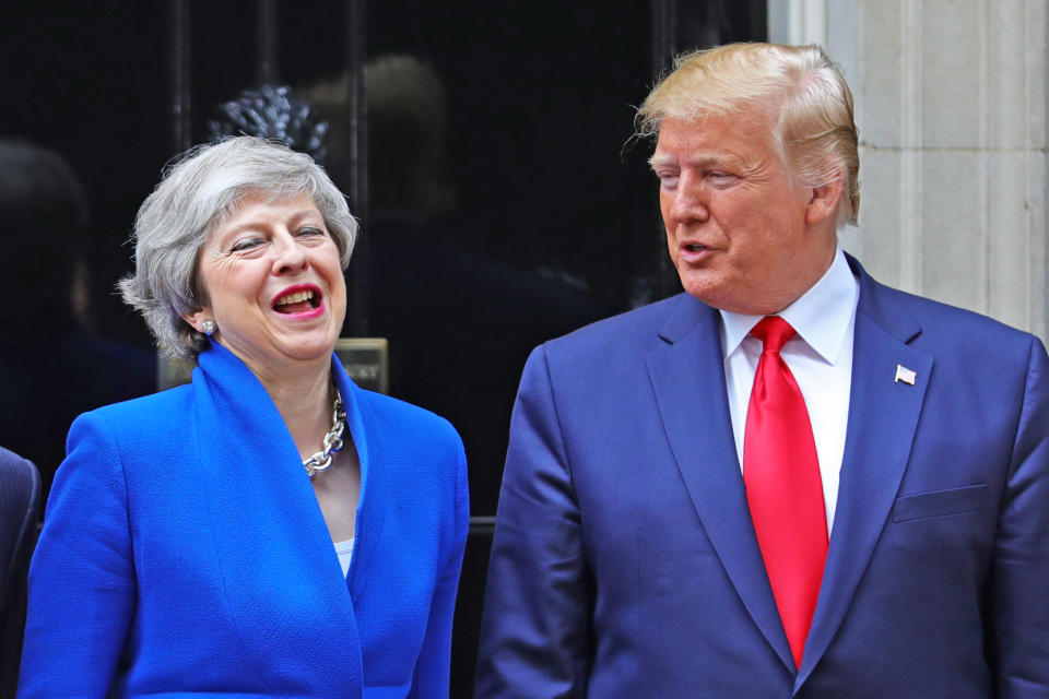 Prime Minister Theresa May welcoming US President Donald Trump to Downing Street, London, on the second day of his state visit to the UK. (PA)