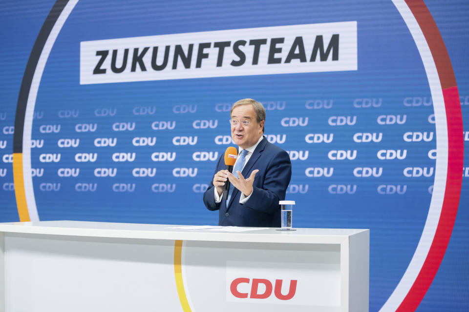 Armin Laschet, CDU candidate for Chancellor, CDU Federal Chairman and Minister President of North Rhine-Westphalia, speaks at the presentation of the Union's 'Future Team at CDU party headquarters in Berlin, Germany, Sept. 3, 2021. The center-right Union bloc's candidate to succeed Angela Merkel as chancellor in this month's German election announced eight experts Friday to advise him on how to tackle issues such as climate change and education, as he struggles to reverse a sustained downward trend in the polls.. The meeting of the CDU's top body discussed, among other things, the upcoming federal election. (Christoph Soeder/dpa via AP)