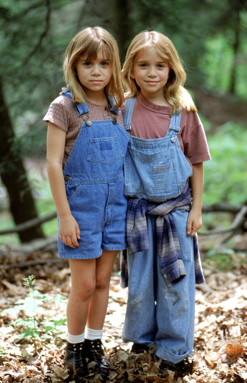 <p>Mary-Kate and Ashley in grungy and proper overall style in ‘It Takes Two’. (Photo: Alamy) </p>