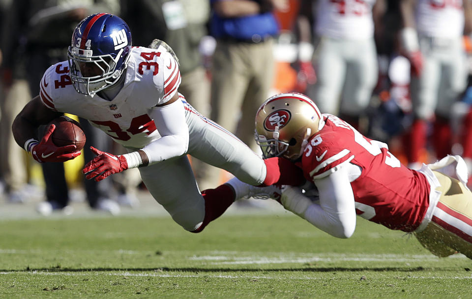 <p>New York Giants running back Shane Vereen (34) is tackled by San Francisco 49ers linebacker Reuben Foster (56) during the first half of an NFL football game in Santa Clara, Calif., Sunday, Nov. 12, 2017. (AP Photo/Marcio Jose Sanchez) </p>