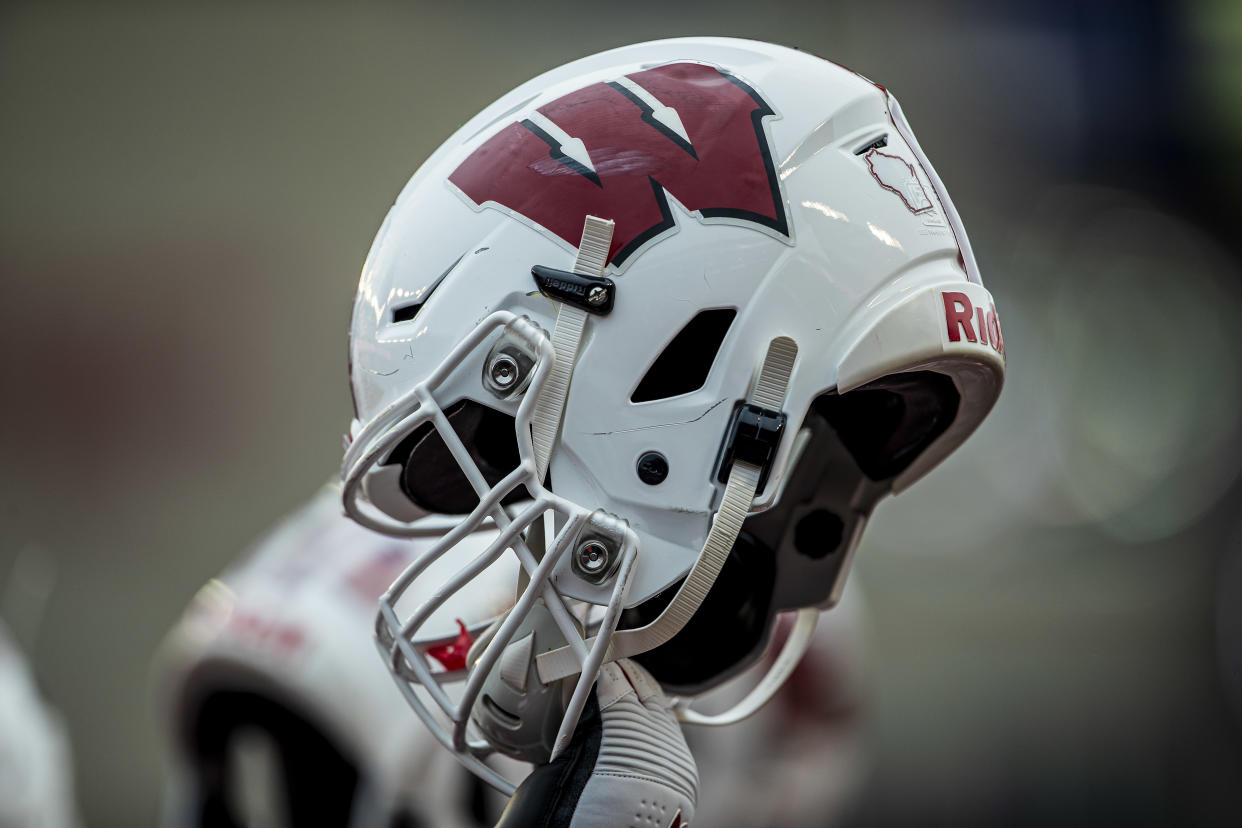 MADISON, WI - OCTOBER 05: A Wisconsin Badger helmet is raised prior to kickoff durning a college football game between the Kent State Golden Flashes and the Wisconsin Badgers on October 5, 2019, at Camp Randall Stadium in Madison, WI. (Photo by Dan Sanger/Icon Sportswire via Getty Images)