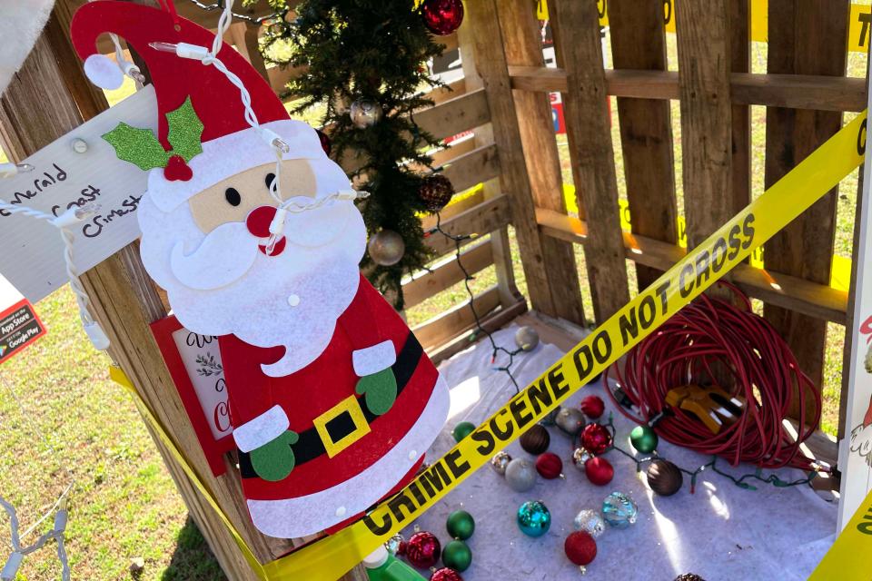 Santa presides over a vandalized Christmas tree at the Emerald Coast Crimestoppers Christmas house. The is one of about 30 Christmas-themed houses that will be part of Fort Walton Beach Police Department's annual "Winter Wonderland" community night out event on Friday, Dec. 9 from 6 p.m. to 10 p.m.