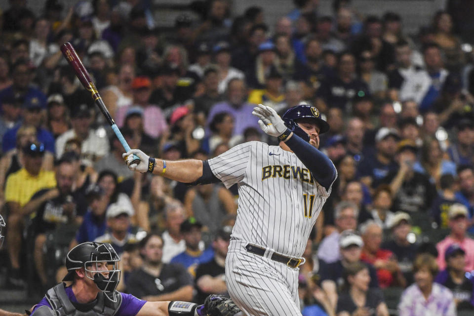 Milwaukee Brewers' Rowdy Tellez watches his single during the first inning of the team's baseball game against the Colorado Rockies on Saturday, July 23, 2022, in Milwaukee. (AP Photo/Kenny Yoo)