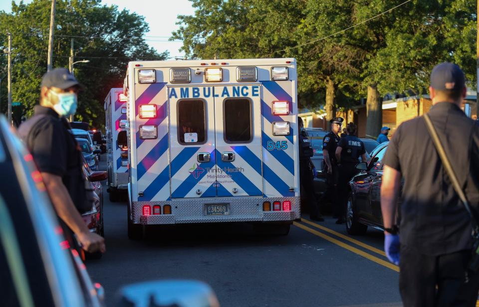 An ambulance leaves with a victim as Wilmington police investigate after a shooting in a park adjacent to the Riverside neighborhood's Kingswood Community Center Wednesday, June 23, 2021. The incident occurred as the park was busy with people dining on nearby picnic tables and gathered around a softball field about 7:40 p.m.