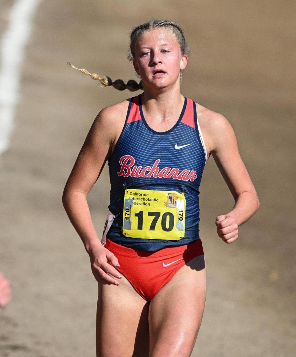 Buchanan’s Tayler Torosian runs near the front going into the final mile in the girls Division I state cross country championships at Woodward Park in Fresno on Saturday, Nov. 25, 2023.