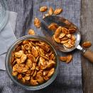 <p>Salty, spicy and garlicky, these roasted pumpkin seeds are the perfect snack for any time of day. Increase the quantity of ground chile if you want 'em extra hot. <a href="https://www.eatingwell.com/recipe/260754/spicy-chile-roasted-pumpkin-seeds/" rel="nofollow noopener" target="_blank" data-ylk="slk:View Recipe" class="link ">View Recipe</a></p>