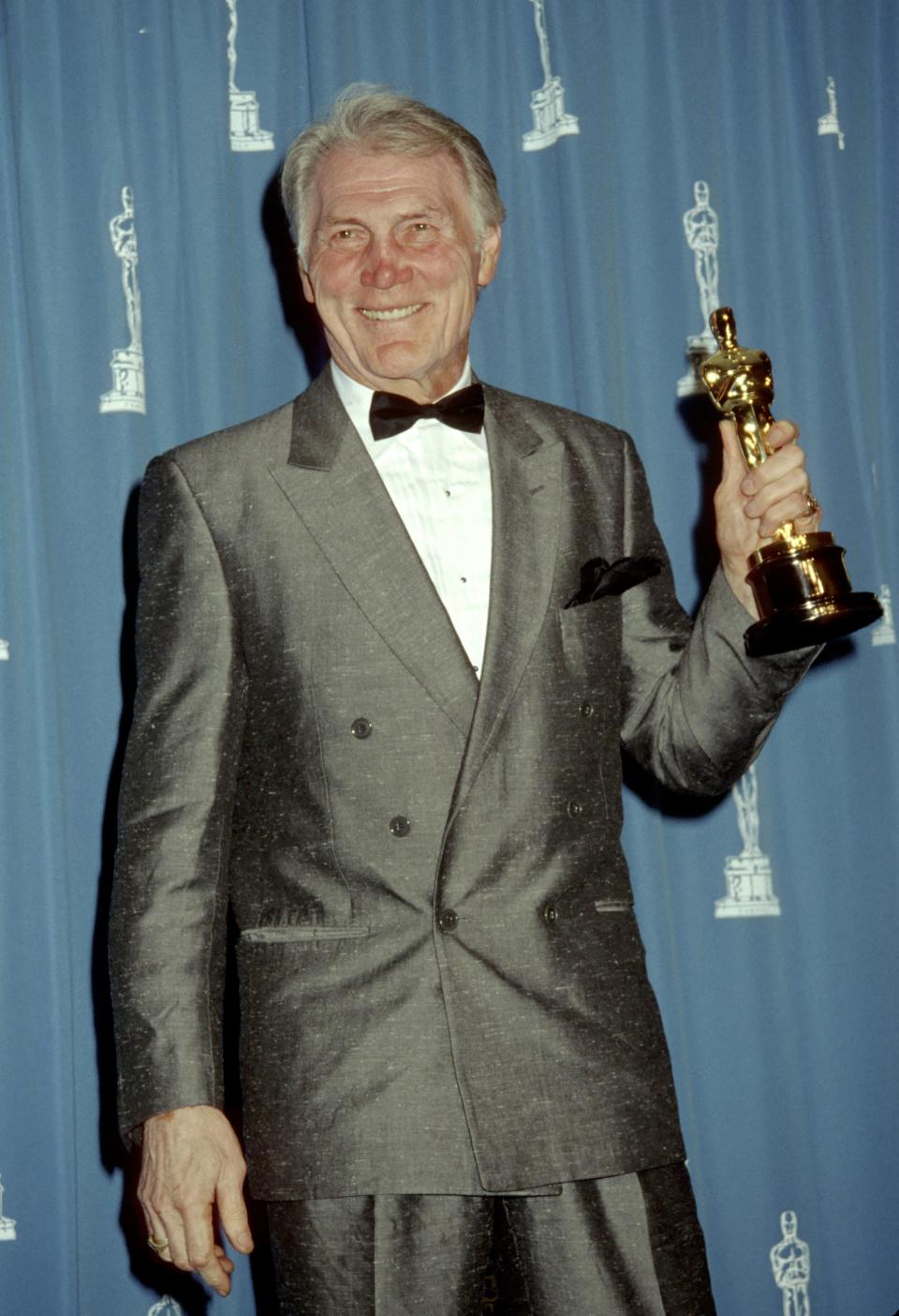 Jack Palance, winner of Best Supporting Actor for "City Slickers" at the Dorothy Chandler Pavilion in Los Angeles, California.