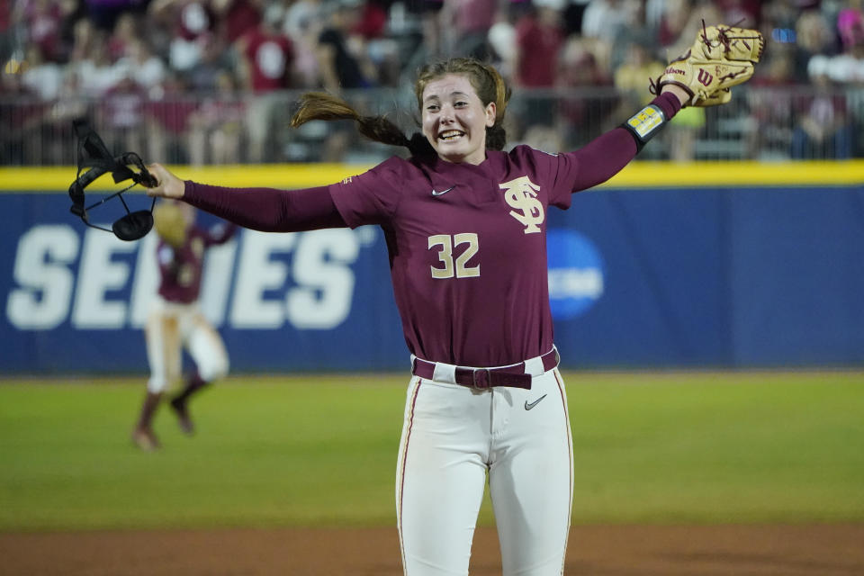 Florida State pitcher Kathryn Sandercock (32) celebrates after Florida State defeated Oklahoma 8-4 in the first game of the NCAA Women's College World Series softball championship series Tuesday, June 8, 2021, in Oklahoma City. (AP Photo/Sue Ogrocki)