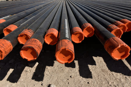 FILE PHOTO: Drill pipe is seen on a drilling site in the Permian Basin oil and natural gas production area near Wink, Texas U.S. August 22, 2018. REUTERS/Nick Oxford/File Photo