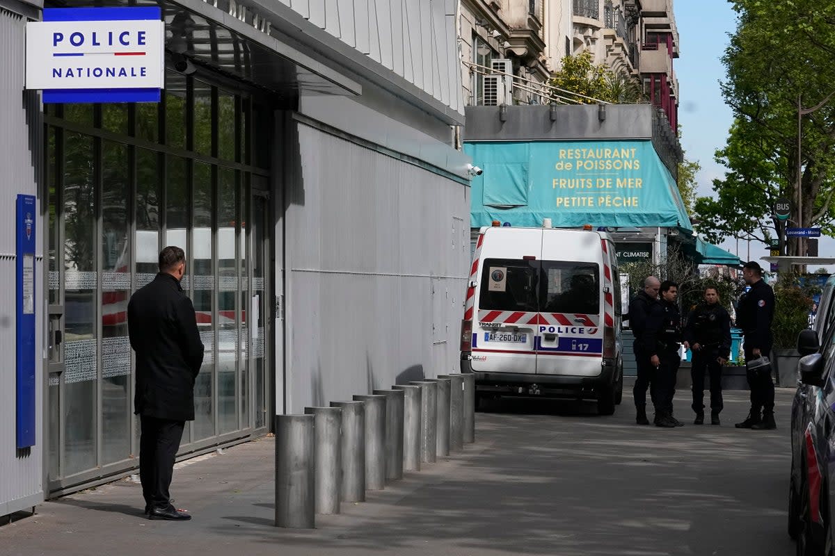 Police officers stand outside the police station where French actor Gerard Depardieu is expected to be questioned (AP)