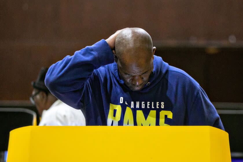 INGLEWOOD, CA - NOVEMBER 08: A man votes at the Rogers Park vote center on Tuesday, Nov. 8, 2022 in Inglewood, CA. (Jason Armond / Los Angeles Times)