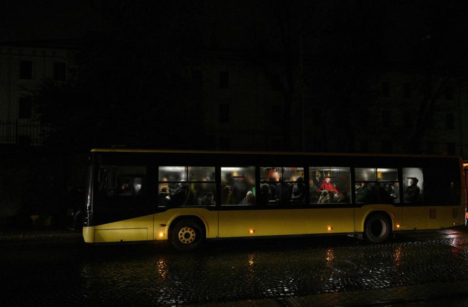 People ride on a city bus during a blackout in Lviv (AFP/Getty)