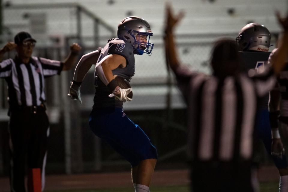 Poudre High School football player Logan Correll celebrates a touchdown against Castle View at French Field in Fort Collins, Colo. on Friday, Sept. 2, 2022.