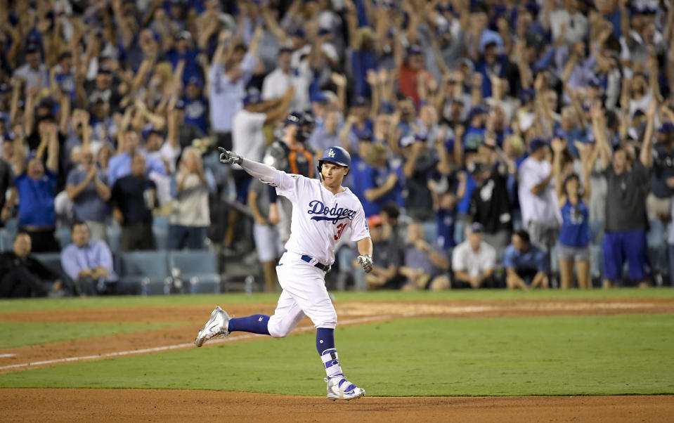 <p>Los Angeles Dodgers’ Joc Pederson celebrates after his home run against the Houston Astros during the fifth inning of Game 2 of baseball’s World Series Wednesday, Oct. 25, 2017, in Los Angeles. (AP Photo/Mark J. Terrill) </p>