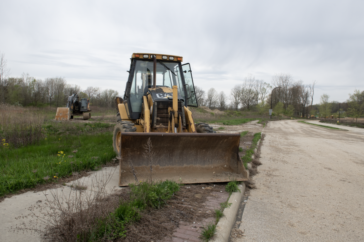 Triton Property Ventures is redeveloping land off of White Pond Drive that will include townhomes, ranch homes, walking trails, a dog park and potentially commercial units such as restaurants and retail.