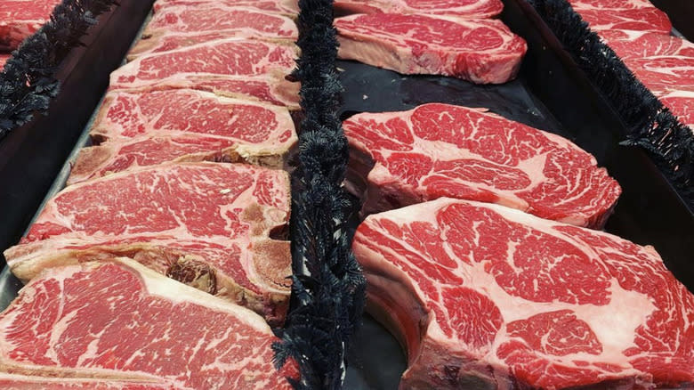 Rows of marbled raw steak